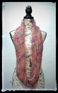 "Aurora" Hand-Knit Twisted Infinity Scarf was created with Jo Sharp Rare Comfort Infusion Kid Mohair blend yarn in Zinger colorway, worn long.